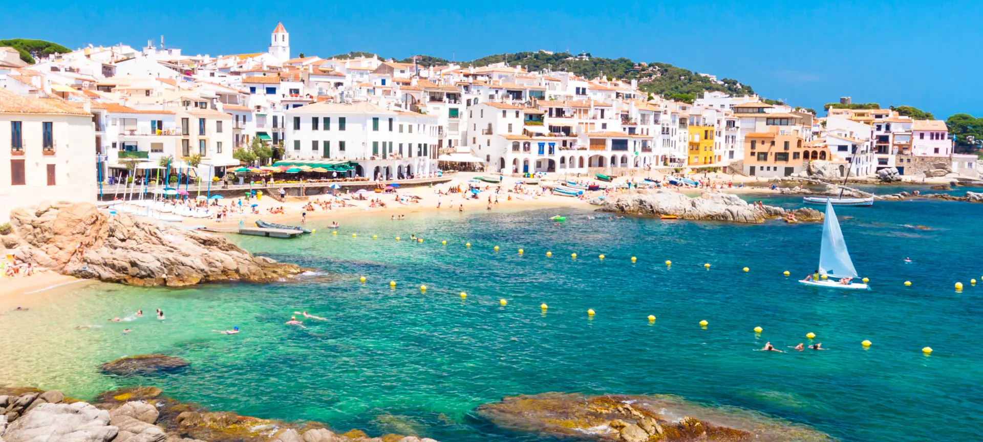 Coastal view of Calella de Palafrugell with whitewashed houses